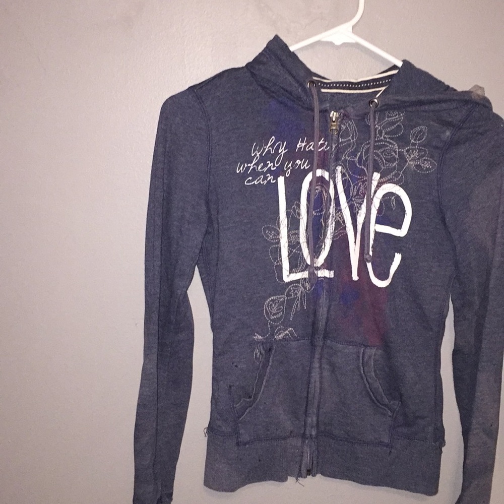 “Why hate when you can love sweater.